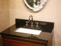 Black Stone Counter with White Porcelain Sink