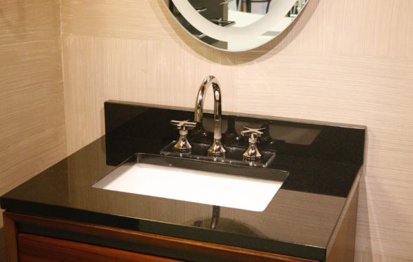 Black Stone Counter with White Porcelain Sink