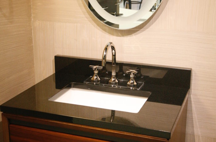 Black Stone Counter with White Porcelain Sink