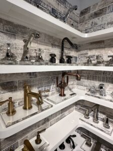 A variety of bathroom faucets on display in Hill's Showcase bathroom showroom in Naples, FL.